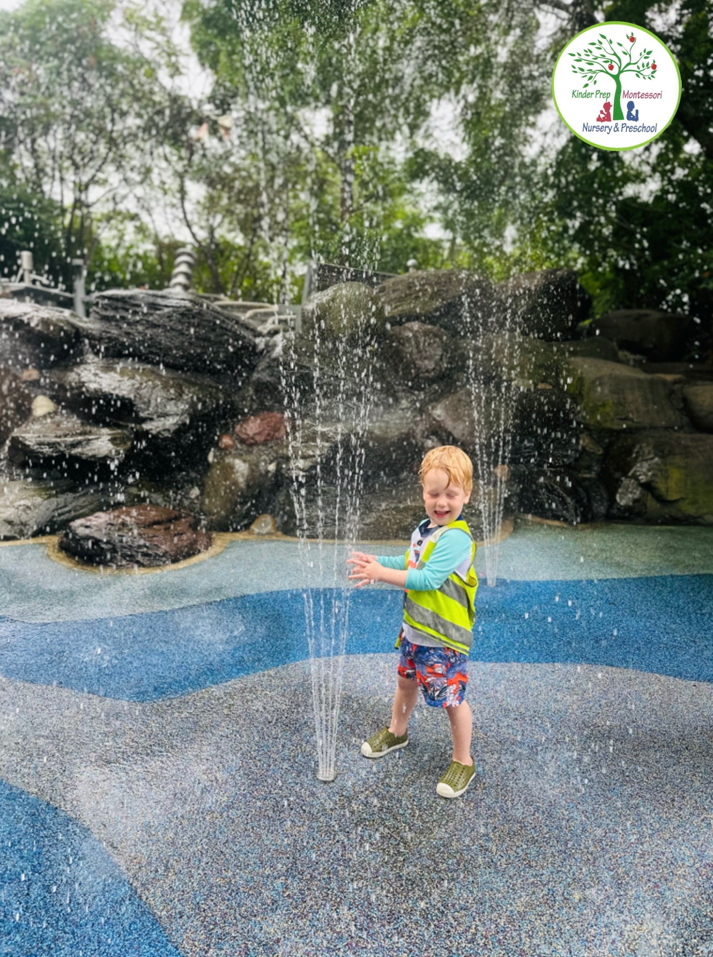 Child enjoying water fountain play at Brooklyn Bridge Park Water Lab during summer camp